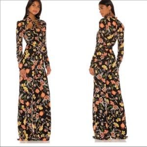 Imogen black flora 70’s floral jump suit XS